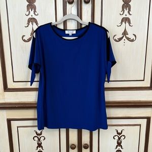 Beautiful business casual blouse with peekaboo shoulders and black piping